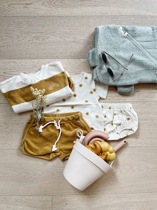 terry track short | gold