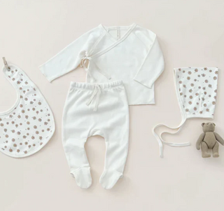 Organic Cotton Baby clothes and accessories flatlay